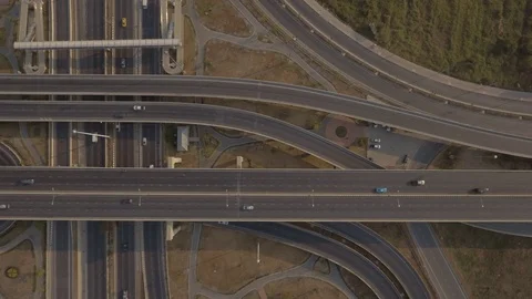 Aerial time lapse of traffic on elevated road intersection Stock Footage 73786549