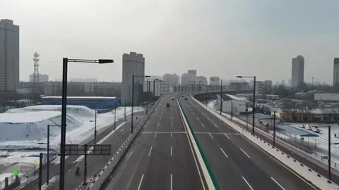 Aerial Time-lapse of Traffic Flowing on Modern Highway Overpass in Chinese C Stock Footage 326282917