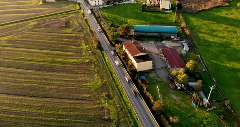 Aerial time lapse of trafic in a contryside landscape. Space for graphic Stock Footage 142357545