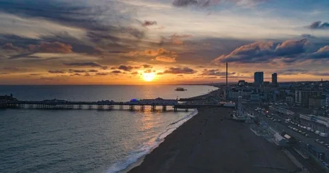 Aerial time lapse view of the seafront in Brighton at sunset (hyperlapse) Stock Footage 80622841