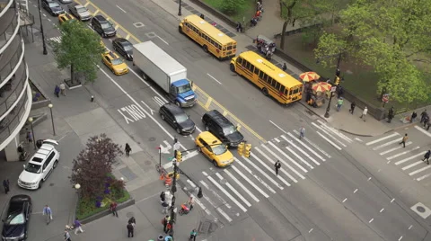 Aerial time lapse view of traffic at an intersection Stock Footage 64287683