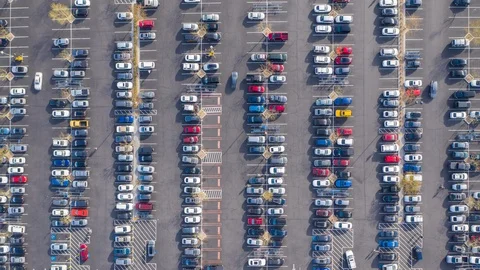 Aerial timelapse of a busy, crowded supermarket parking lot in suburban USA Stock Footage