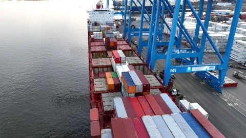 Aerial Timelapse of Cargo Ship Being Loaded and Unloaded Stock Footage 229452150