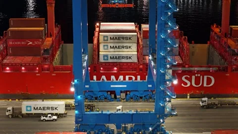 Aerial Timelapse of Cargo Ship Being Loaded and Unloaded in Port Stock Footage 325276393