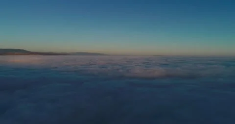 Aerial timelapse with drone above the clouds on evening Stock Footage 146647652