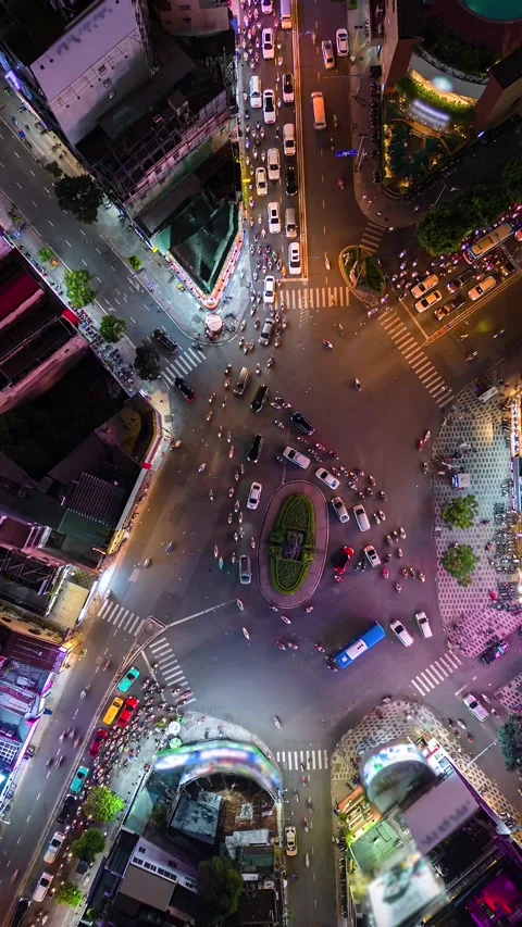Aerial timelapse of evening traffic at intersection in Ho Chi Minh City, Vietnam Stock Footage 255426572