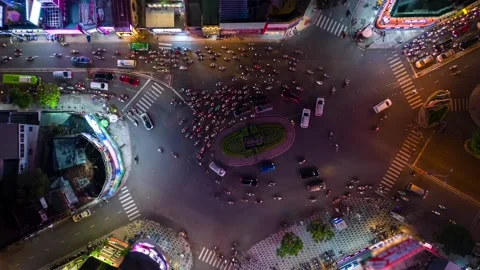 Aerial timelapse of evening traffic at intersection in Ho Chi Minh City, Vietnam Stock Footage 255426587