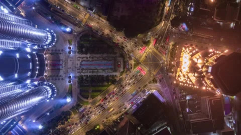 Aerial timelapse of evening traffic at an intersection in Kuala Lumpur, Malaysia Stock Footage 280824316