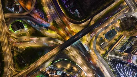Aerial Timelapse Of Evening Traffic At Intersection In Kuala Lumpur, Malaysia Video stock 290497798