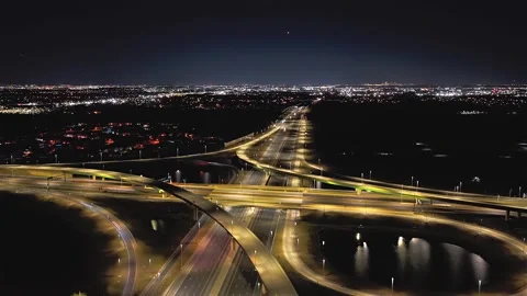 An aerial timelapse of a large stack interchange on Florida's Turnpike on a Stock Footage 331968008