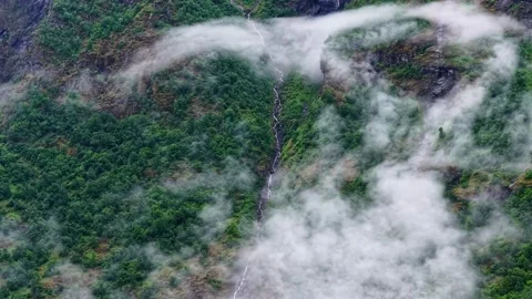 Aerial Timelapse of Moving Clouds Over Waterfall in Flam Aurland Norway Stock Footage 340859012