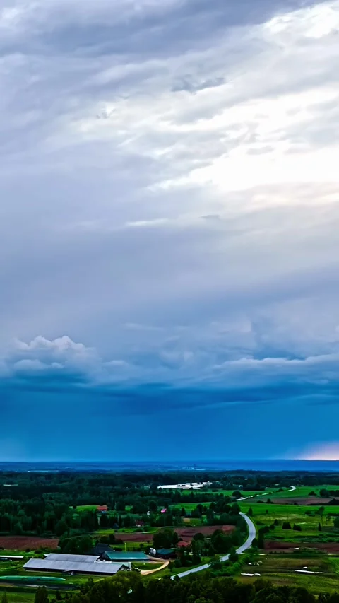 Aerial timelapse over rural Latvia under dramatic storm clouds Vídeos de archivo 345117853