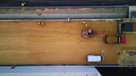 Aerial timelapse of road construction site with heavy machinery. 库存影片 334448001