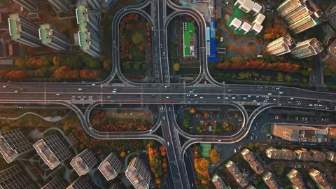 Aerial timelapse shot of complex freeway interchange with flowing traffic in Stock-Footage 332831921