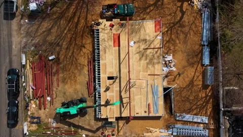 Aerial timelapse straight down over new home construction in a middle-class Stock Footage 333889577