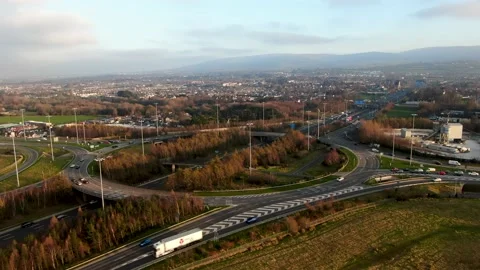 An aerial timelapse of traffic moving through the M50 motorway and the N81 road Stock Footage 149624256