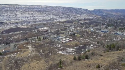 Aerial tiny industrial town in the winter Stock Footage 73486817