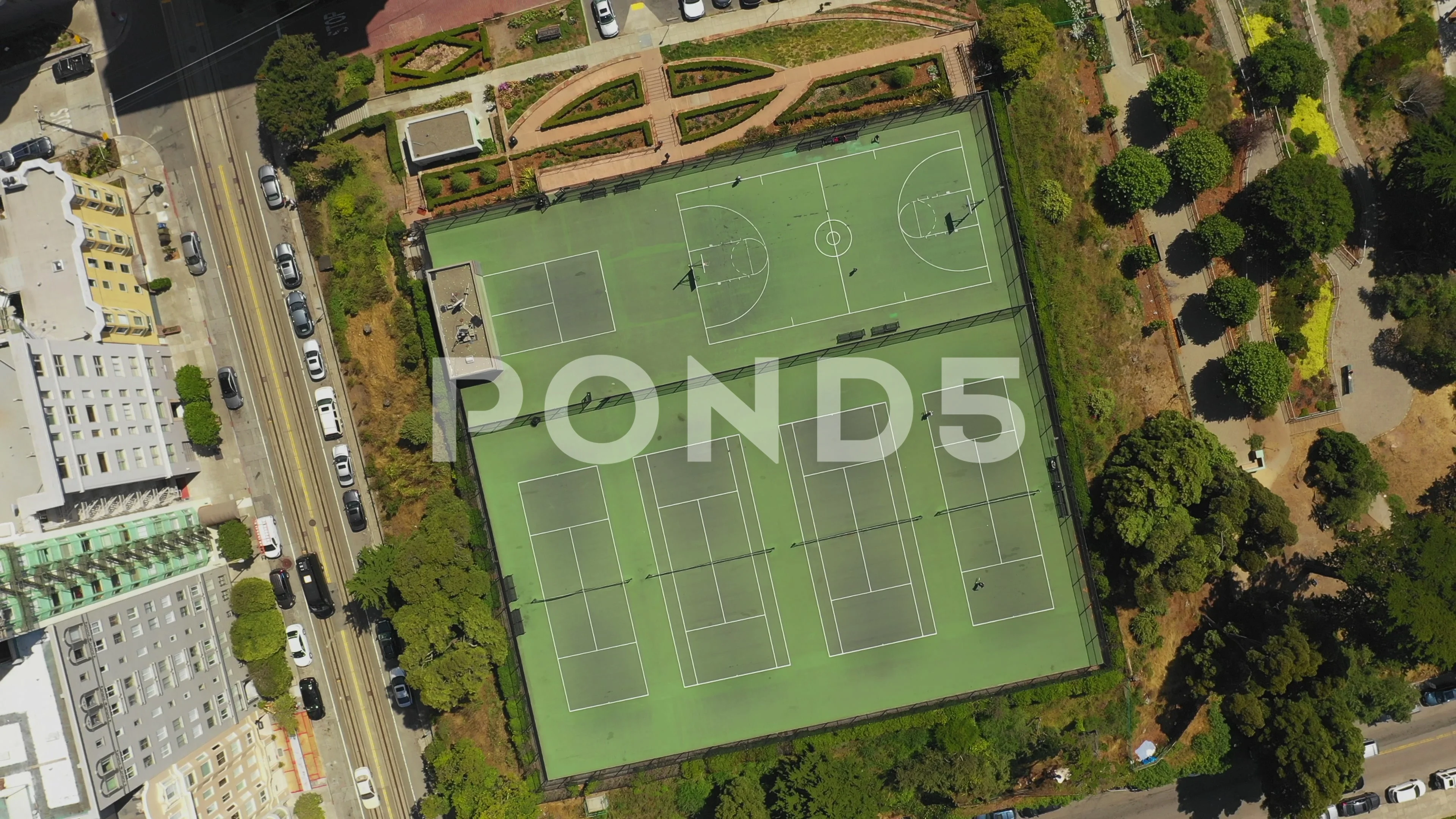 Aerial Top Ascend People at sports courts amidst streets in city San Francisc