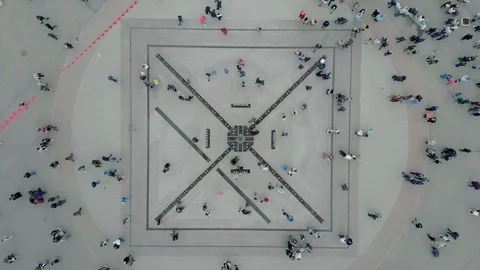 Aerial top down 4k view of people walking in the square Video stock 123838432