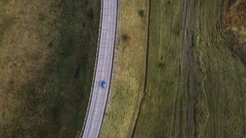 Aerial top down 4k view of car traffic driving on country road Video stock 140770682