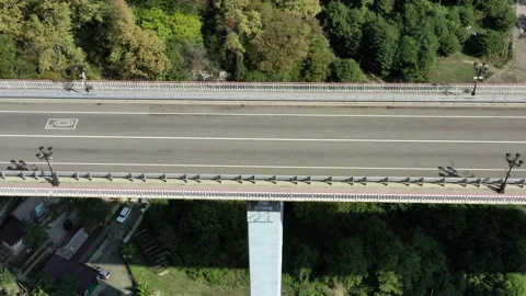 Aerial top down 4k view car driving. Cinematic drone shot flying over road. Top 動画素材 143904727