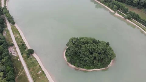 Aerial top down 4k view of a beautiful circular island in the middle of lake Stock Footage 147628393