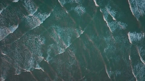 Aerial: Top down abstract wave patterns in the ocean Stock Footage 194899733