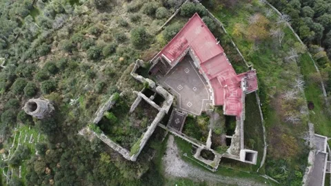 Aerial top down ascending view of Norman Lombard ruin abandoned castle Stock Footage 166475283