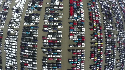 Aerial top down bird view new car storage parking lot imported new vehicles 4k Stock Footage 61248589