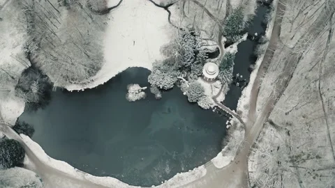 Aerial Top Down Bird View of German Forrest Parc covered with Snow Stock Footage 152347085
