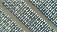 Aerial Top Down: Brand New Cars Waiting For Sale At Industrial Port Parking Lot Stock Footage