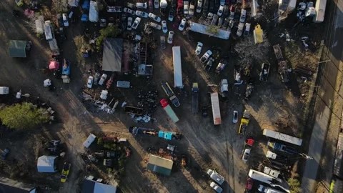 Aerial top down car graveyard winter after Hurricane Helene in Dearing McDu.. Stock Footage 316988218