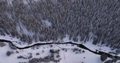Aerial top down cinematic winter snow covered country road, asphalt road Stock Footage 205094366