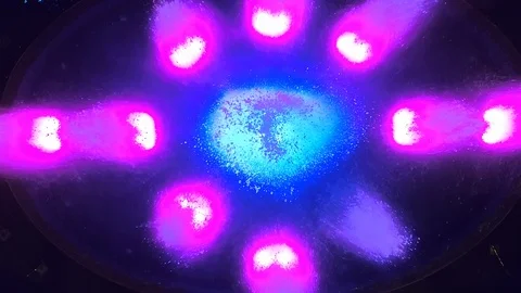 Aerial top down close-up view of colorful fountain at night Stock Footage 107508332