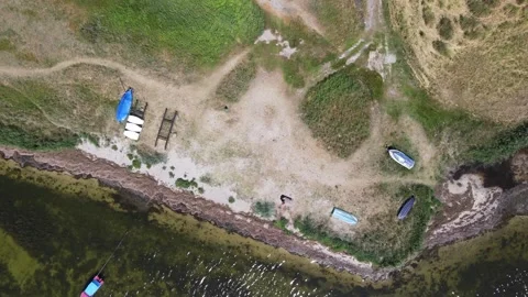Aerial top down of coast of the Baltic Sea in Mnchgut Rgen Germany 스톡 동영상 250085705