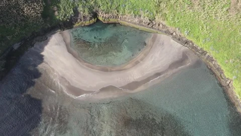 Aerial top-down counter-clockwise rotation over Vila Franca do Campo, Azores,4K Stock Footage 333364441