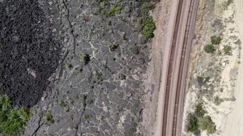 Aerial top down of dried black lava field along historic route 66 Anzac New.. 스톡 동영상 320739084