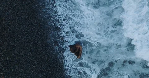 Aerial Top Down Drone Abstract of Shorebreak on Black Rocks El Tunco El Stock Footage 243798371