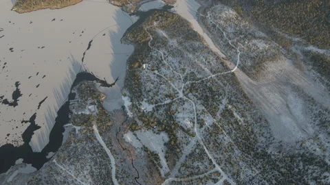 Aerial Top Down Drone Flight Over Rural Area With Cabins At Frozen Lake Stock Footage 224256493