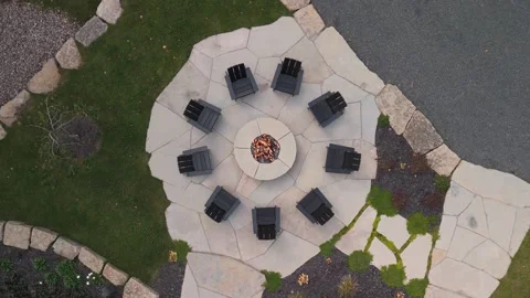 Aerial top down drone rotate above fire pit table with bon fire outdoor in Stock Footage 290830195