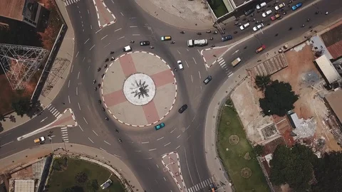 Aerial top down drone shot of street circle in Togo Africa Stock Footage