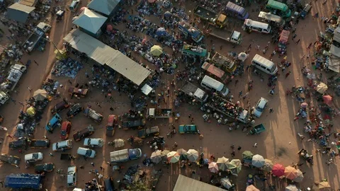 Aerial top down drone shot of African market in Ghana. A big group of Stock Footage 121772938