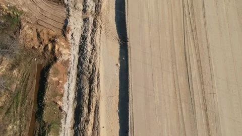 Aerial Top Down Drone Shot. Highway construction. Deforestation for a new Stock Footage 134323484