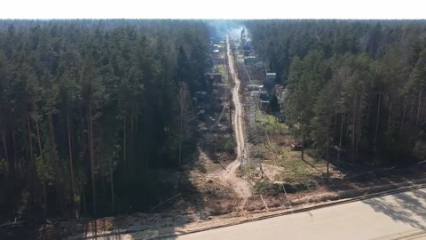 Aerial Top Down Drone Shot. Highway construction. Deforestation for a new Stock Footage 134323949