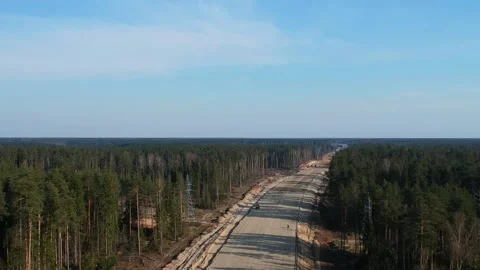 Aerial Top Down Drone Shot. Highway construction. Deforestation for a new Stock Footage 134326358