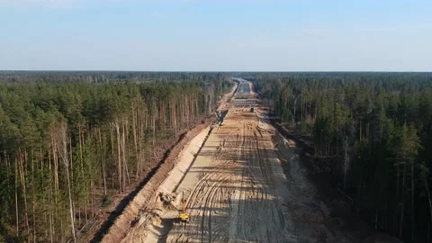 Aerial Top Down Drone Shot. Highway construction. Deforestation for a new Stock Footage 134326644