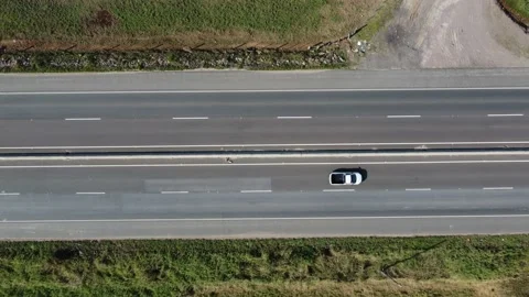 Aerial top down drone shot above cars driving on the street 4k. Stock Footage 157191238