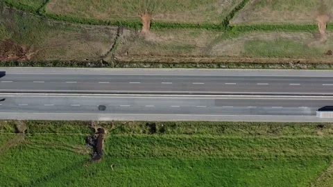 Aerial top down drone shot above cars driving on the street 4k. Stock Footage 157191317