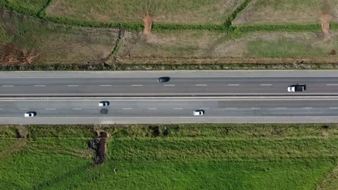 Aerial top down drone shot above cars driving on the street 4k. Stock Footage 157191456