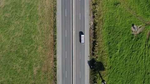 Aerial top down drone shot above cars driving on the street 4k. Stock Footage 157191673